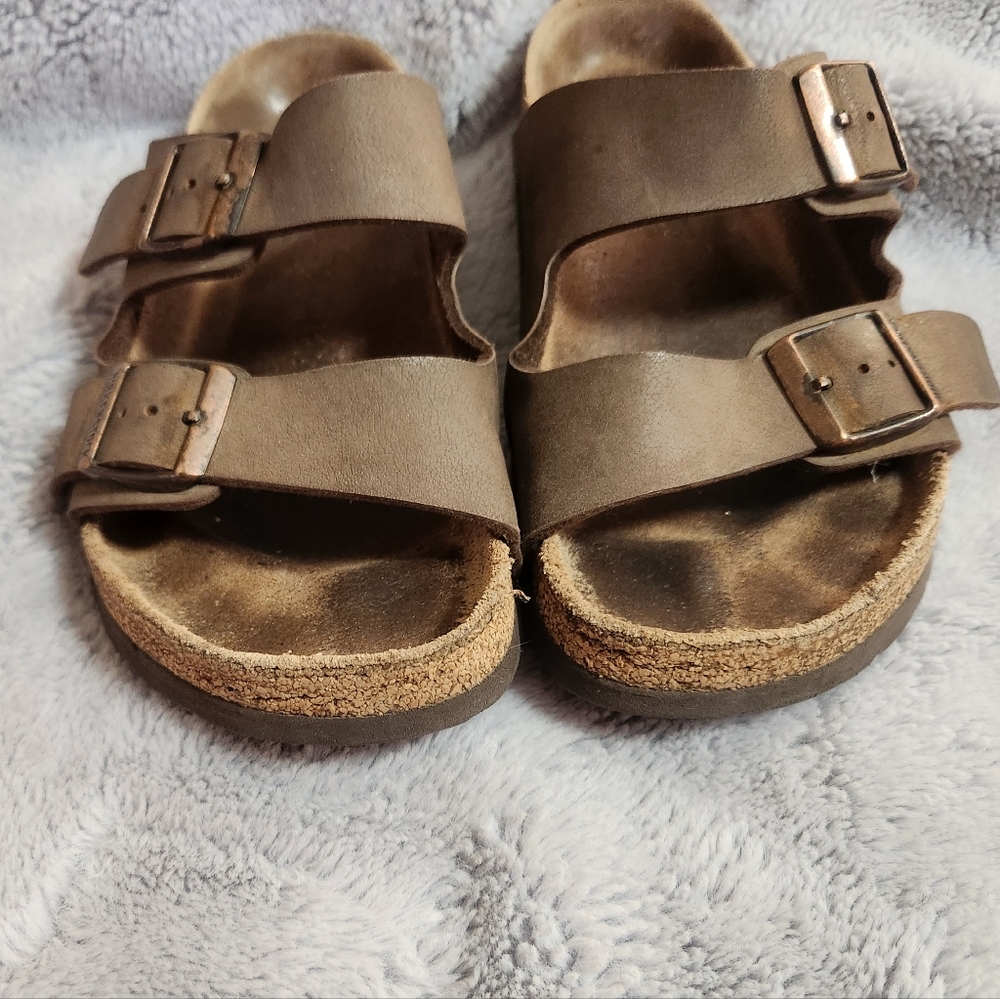 Birkenstock Arizona leather sandals.